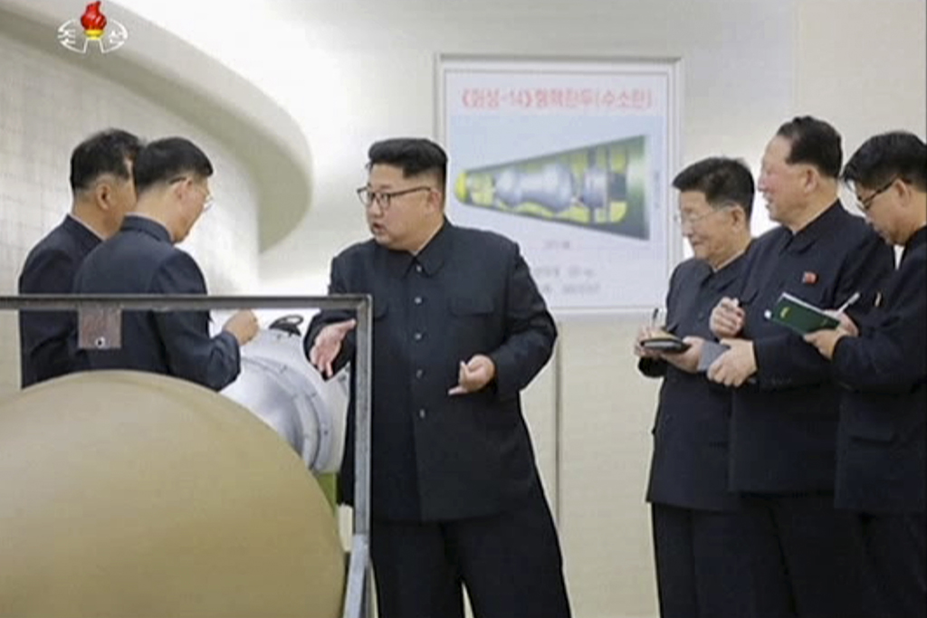 In this image made from video by North Korea's KRT released on Sunday, Sept. 3, 2017, shows North Korean leader Kim Jong Un at an undisclosed location. North Korea’s state media on Sunday, Sept 3, 2017, said leader Kim Jong Un inspected the loading of a hydrogen bomb into a new intercontinental ballistic missile, a claim to technological mastery that some outside experts will doubt but that will raise already high worries on the Korean Peninsula. Independent journalists were not given access to cover the event depicted in this image distributed by the North Korean government. The content of this image is as provided and cannot be independently verified. (KRT via AP Video)