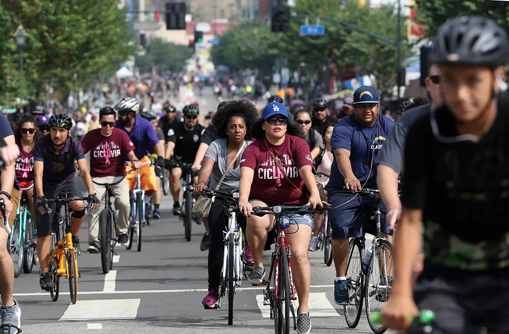 Bicyclists ride along the streets of downtown Los Angeles on October 18, 2015. (AP/Richard Vogel)