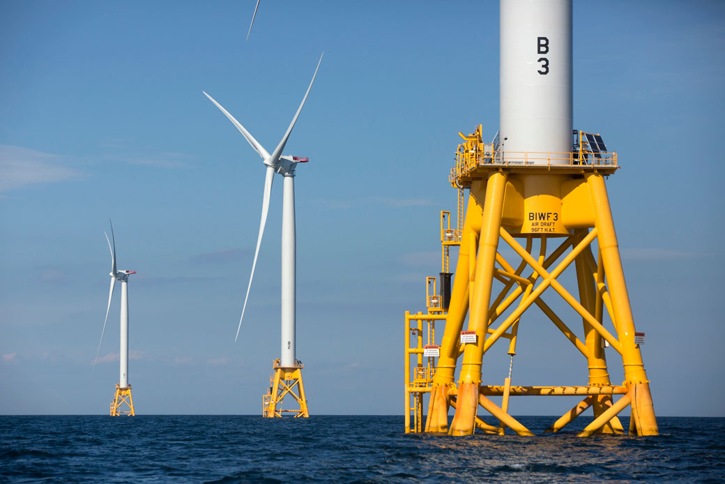 Three turbines of the Block Island Wind Farm stand offshore of Block Island, Rhode Island, August 15, 2016.