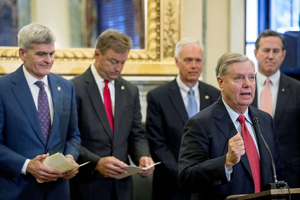 From left, Sen. Bill Cassidy (R-LA). Sen. Dean Heller (R-NV), Sen. Ron Johnson (R-WI), Sen. Lindsey Graham (R-SC), and former Sen. Rick Santorum (R-PA) hold a press conference on Capitol Hill in Washington, September 13, 2017, to unveil legislation to reform health care. (AP Photo/Andrew Harnik) (AP/Andrew Harnik)