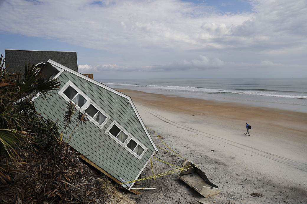 A house rests on the beach after collapsing off a cliff from Hurricane Irma in Vilano Beach, Florida, September 15, 2017. (AP/David Goldman)