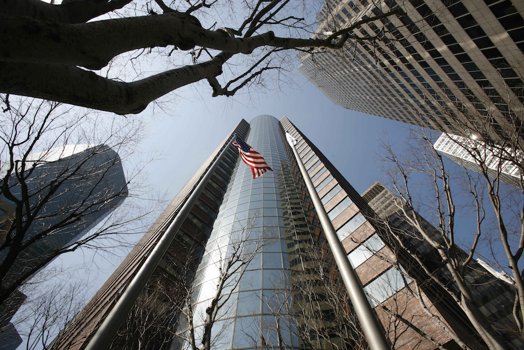 AIG, headquartered in New York City, is no longer subject to enhanced government oversight. (AP/Mark Lennihan)