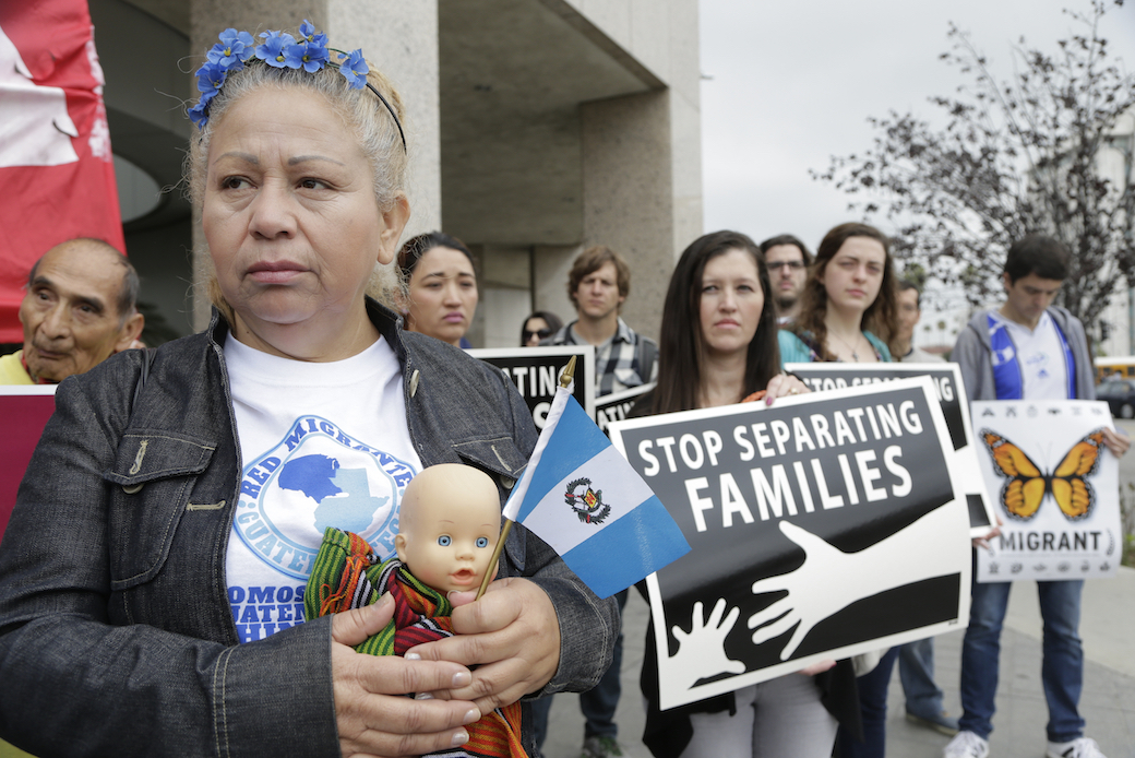 Immigrant families in Los Angeles rally in support of the Temporary Protected Status program, May 17, 2016. (AP/Nick Ut)