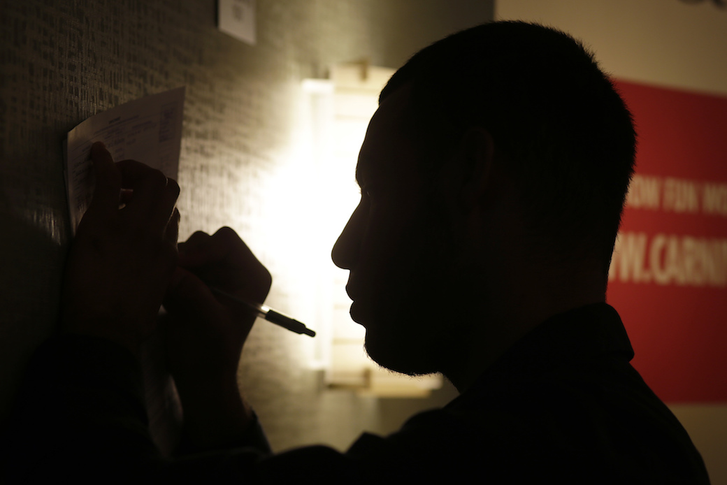 A man fills out a job application at a job fair in Miami Lakes, Florida, in July 2016. (AP/Lynne Sladky)