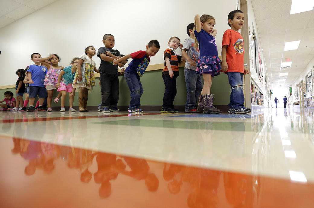 Pre-K students line up outside a classroom in San Antonio, April 2014. (AP/Eric Gay)