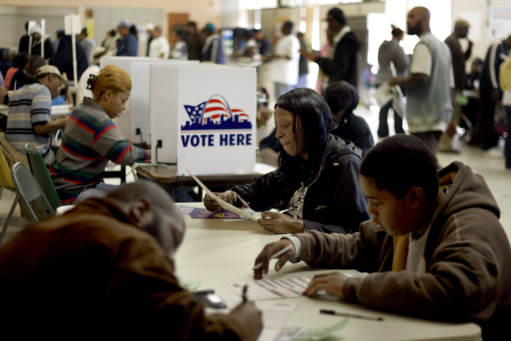 Voters in a predominantly African American polling place in St. Louis, Missouri, cast their ballots, November 2008. (AP/Jeff Roberson)