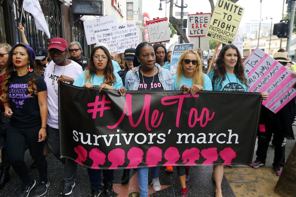 Women march against sexual assault and harassment for the #MeToo March in Los Angeles, November 12, 2017. (AP/Damian Dovarganes)