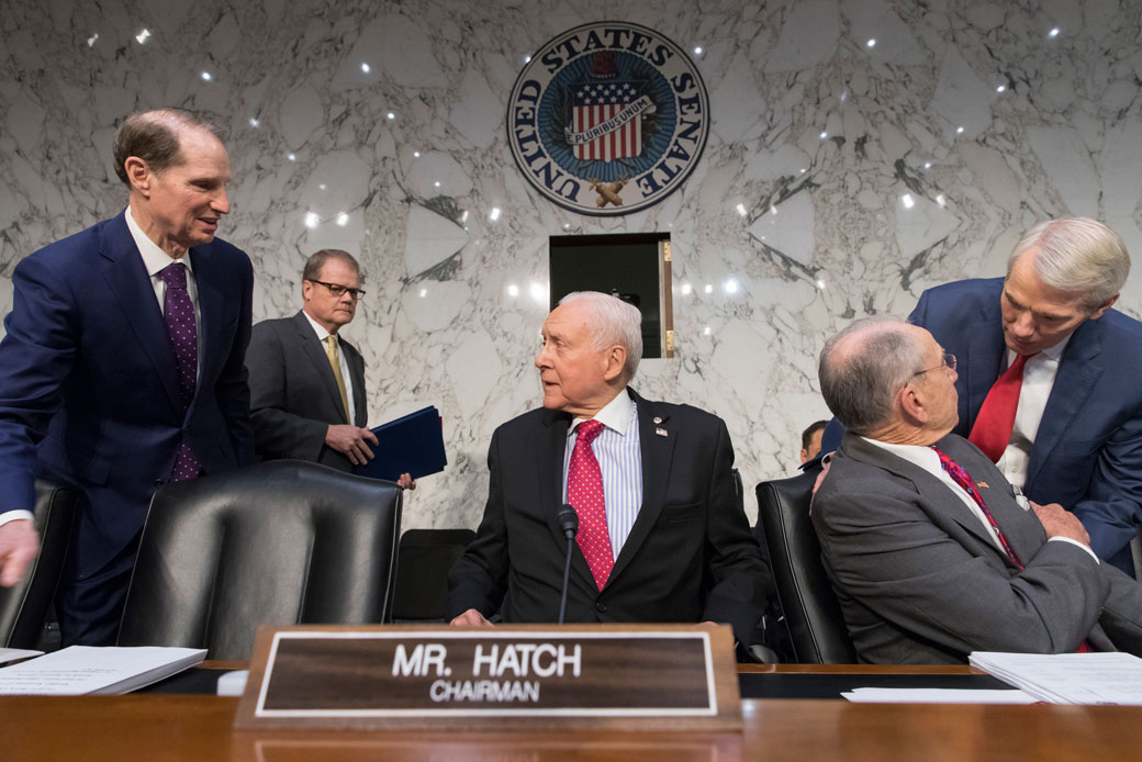 Sen. Orrin Hatch (R-UT) welcomes other senators, Washington, November 13, 2017. (AP/J. Scott Applewhite)