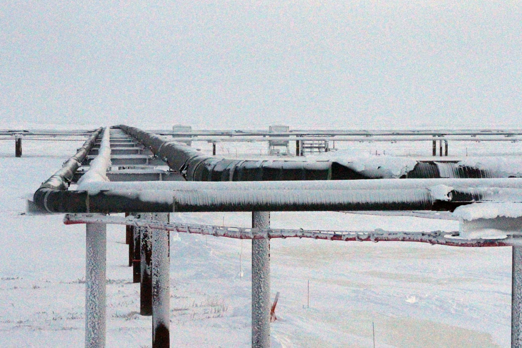 Ice forms on pipelines built near a drilling site on Alaska's North Slope, February 2016. (AP/Mark Thiessen)