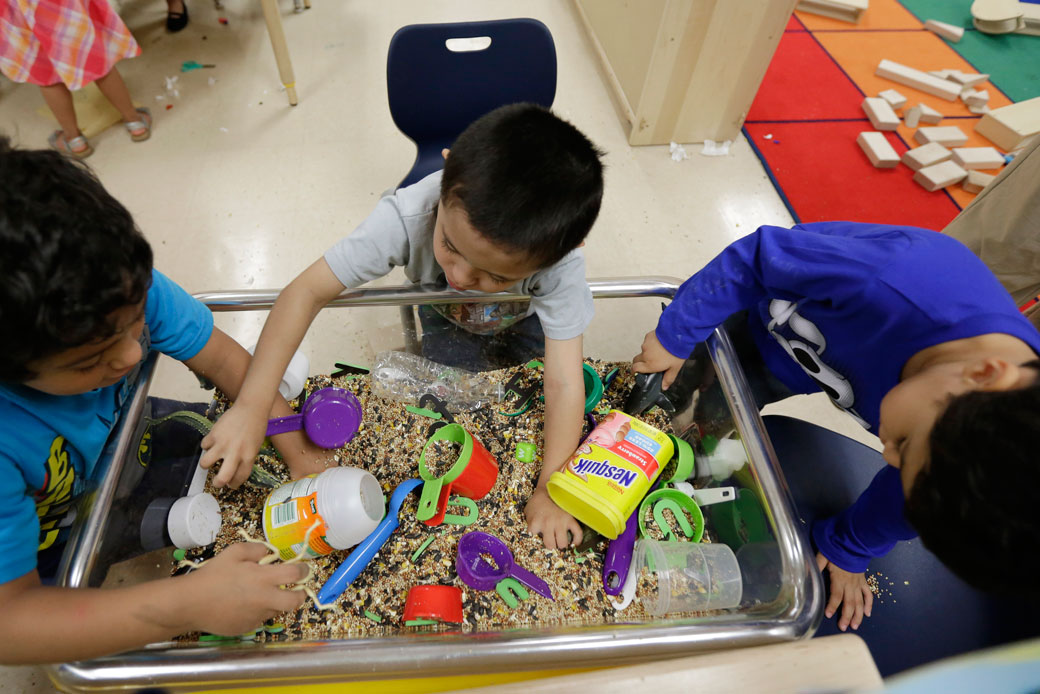 Pre-K students play with educational toys at an education center, April 2, 2014, in San Antonio. (AP/Eric Gay)