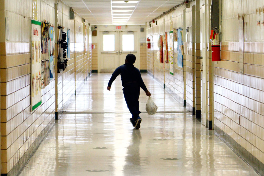 An elementary school student skips to class in Jackson, Mississippi, October 28, 2015. (AP/Rogelio V. Solis)