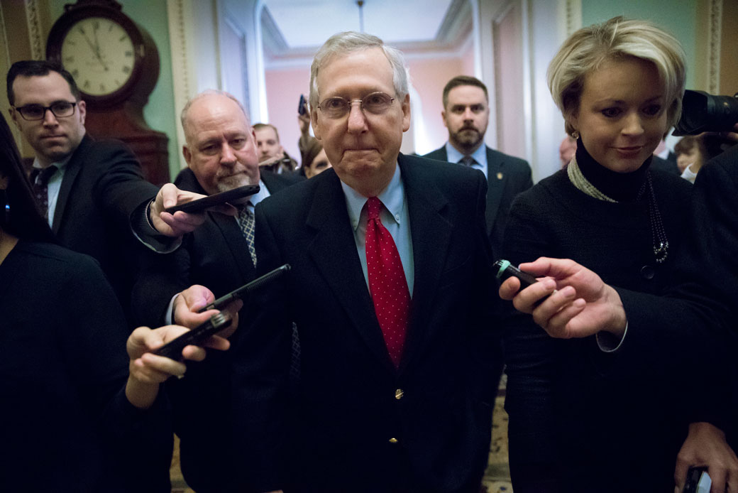 Senate Majority Leader Mitch McConnell walks to the chamber after a closed-door meeting with Republican lawmakers. (AP/J. Scott Applewhite)