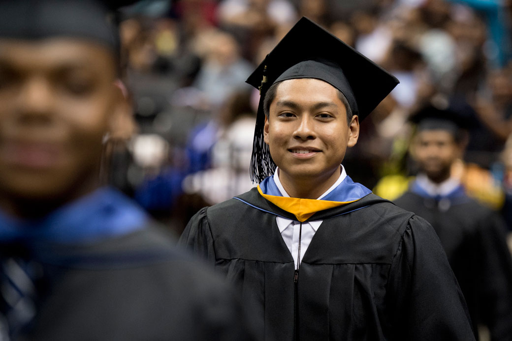 A 17-year-old graduates in a commencement exercise at Barclays Center in Brooklyn, New York, on June 5, 2017. (AP/Jon Simon/Feature Photo Service for IBM)