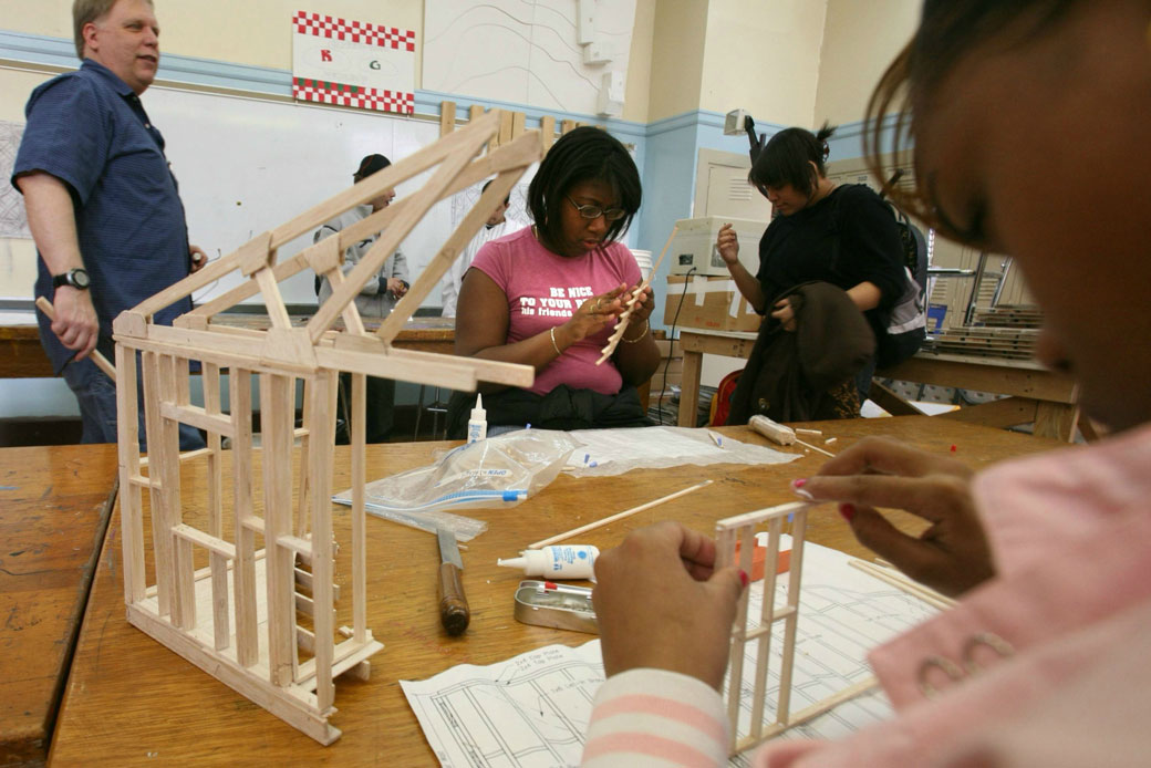 New York high school students build a model design of a house frame, March 2007.