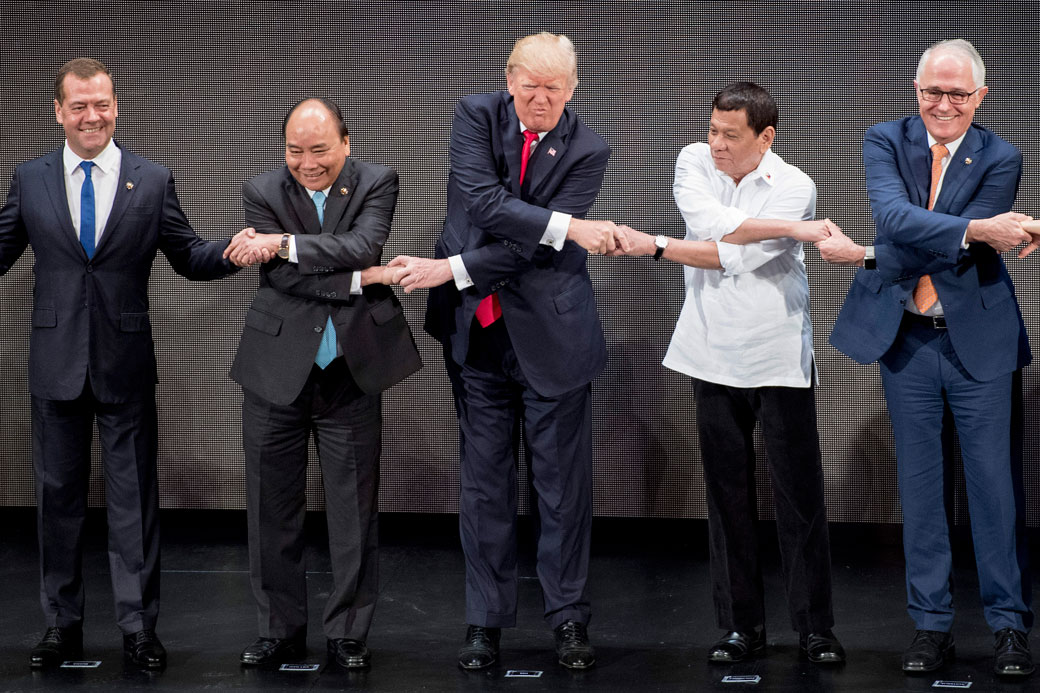 President Trump joins hands with other foreign leaders for a photo during the opening ceremony of the 31st Association of Southeast Asian Nations (ASEAN) Summit in Manila, Philippines, on November 13, 2017. (Getty Images/Jim Watson)