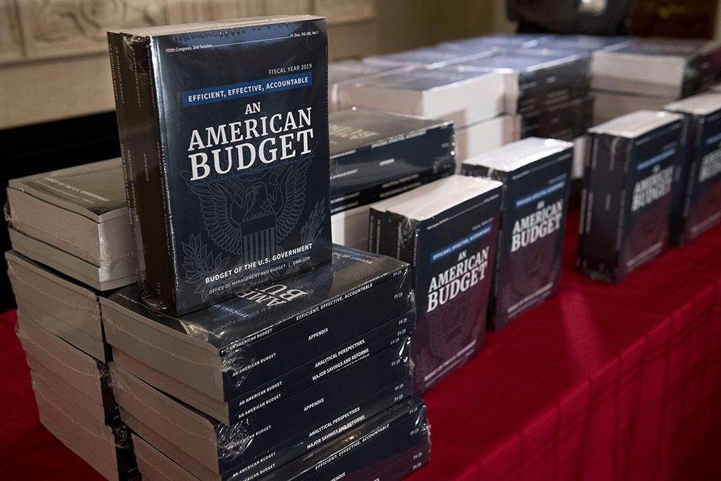 Copies of President Donald Trump's fiscal year 2019 budget sit on a table at the House Budget Committee on Capitol Hill in Washington, February 12, 2018. (Getty/AFP/Saul Loeb)