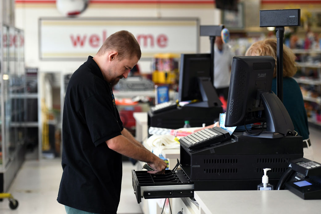 A cashier checks out a customer in Lakewood, Colorado, August 11, 2017. (Getty/Joe Amon/The Denver Post)