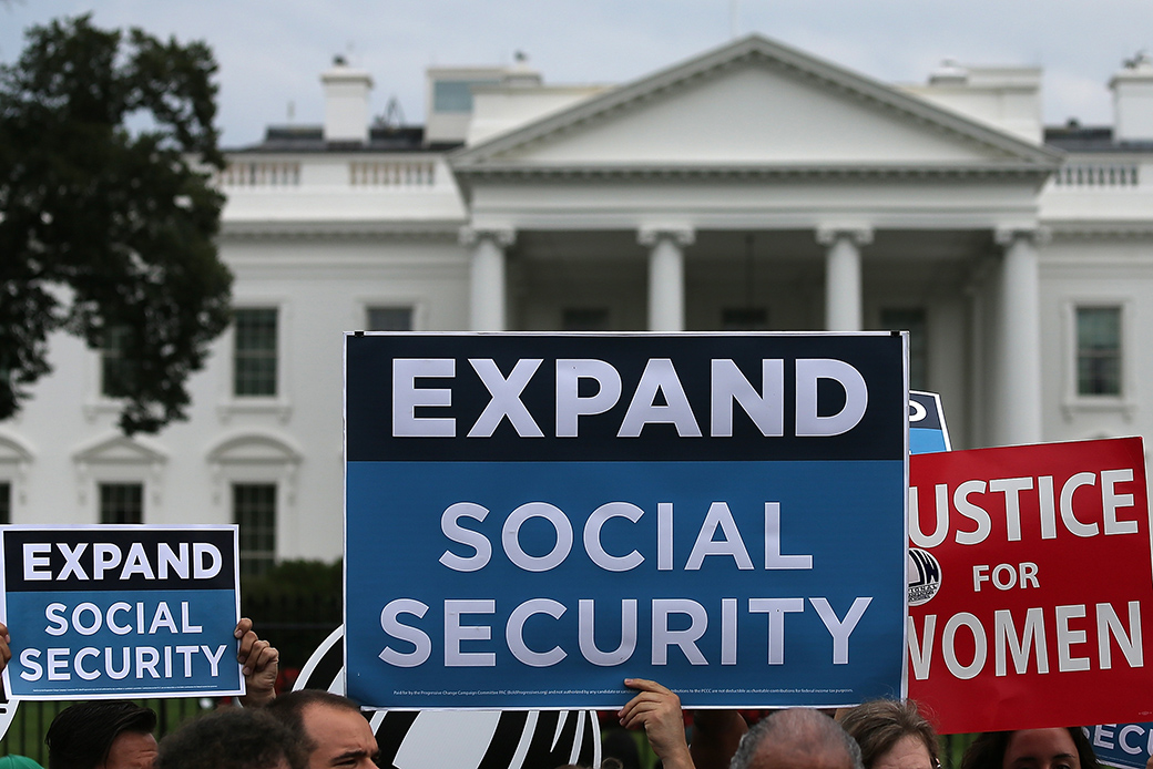 Activists participate in a rally urging the expansion of Social Security benefits in front of the White House, July 13, 2015, in Washington, D.C. (Getty/Win McNamee)