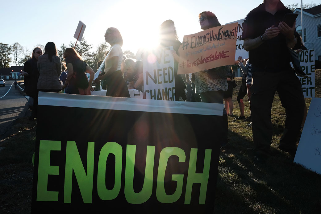 Dozens of people bring attention to gun violence as they attend a vigil in Newtown, Connecticut, which was held for victims of the 2017 Las Vegas mass shooting, October 2017. (Getty/Spencer Platt)