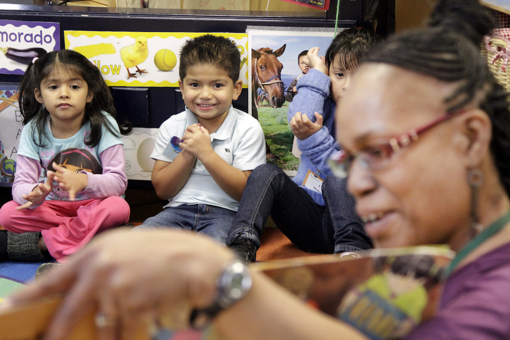A Los Angeles preschool teacher conducts a class as preschoolers look on, March 2013. (Getty/Lawrence K. Ho/Los Angeles Times)