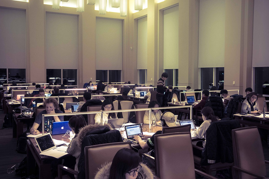 College students study at night in a campus reading room in Maryland, 2015. (Getty/JHU Sheridan Libraries/Gado)