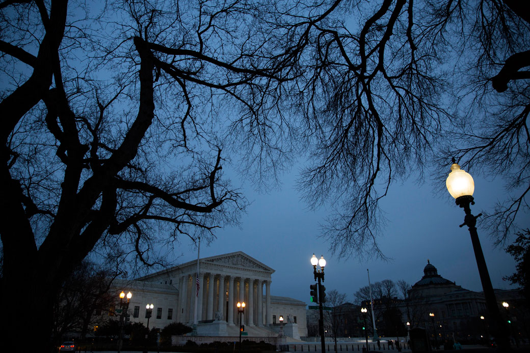 The U.S. Supreme Court in Washington, D.C., is seen at dusk, February 2016. (Getty/Drew Angerer)