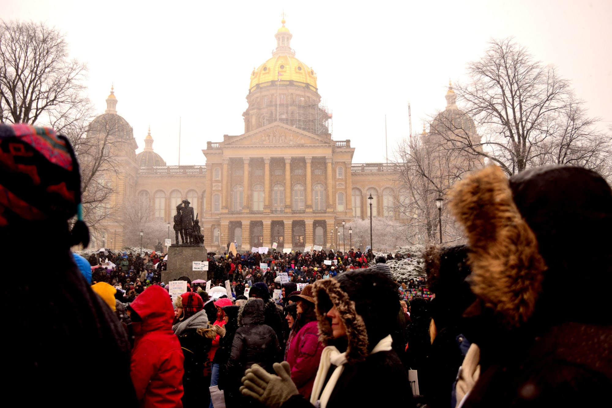 Protesters march in front of the Iowa State Capitol in Des Moines, Iowa, during the March for Our Lives rally on March 24, 2018. (Brandi Webber)