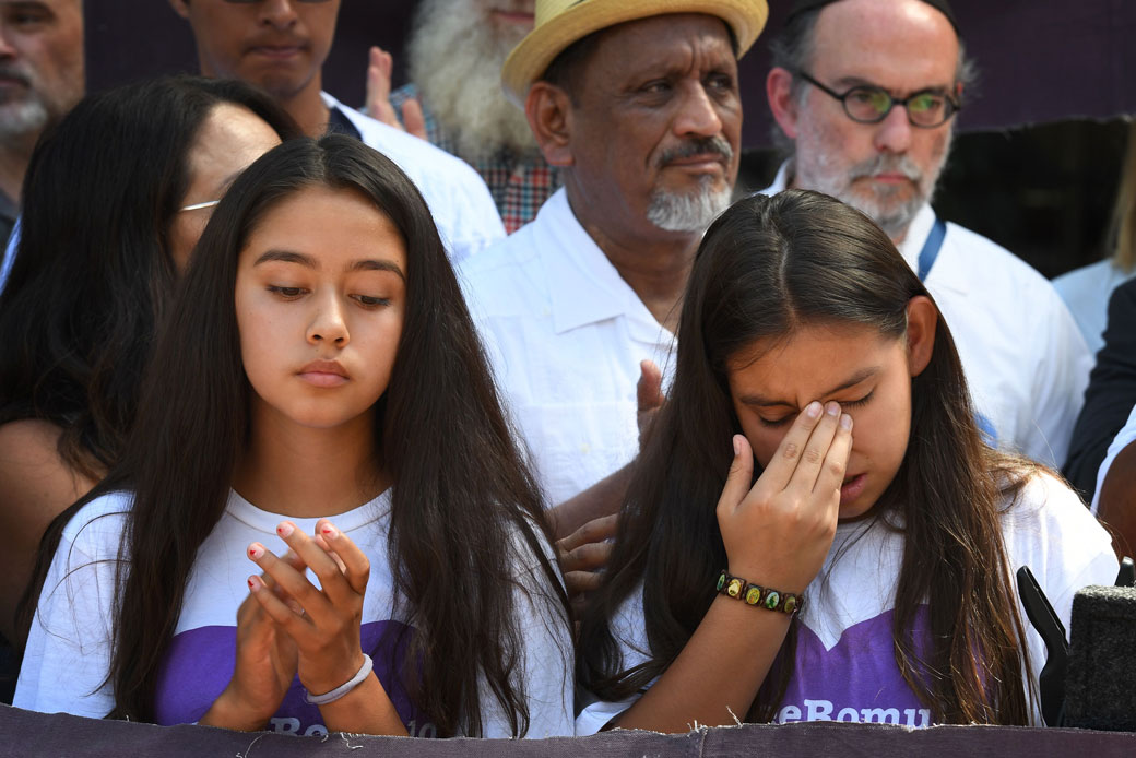 The daughters of Romulo Avelica-Gonzalez, who was detained by Immigration and Customs Enforcement officers after dropping off one of his daughters at school, attend a press conference in Los Angeles on August 1, 2017. (Getty/Mark Ralston)
