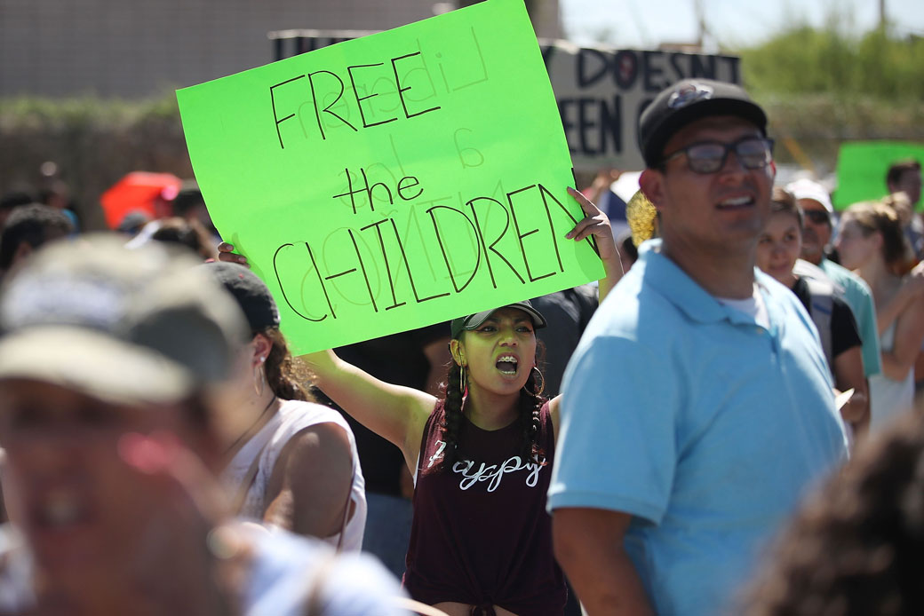 People protest the separation of children from their parents in front of the El Paso Processing Center, June 19, 2018. (Getty/Joe Raedle)