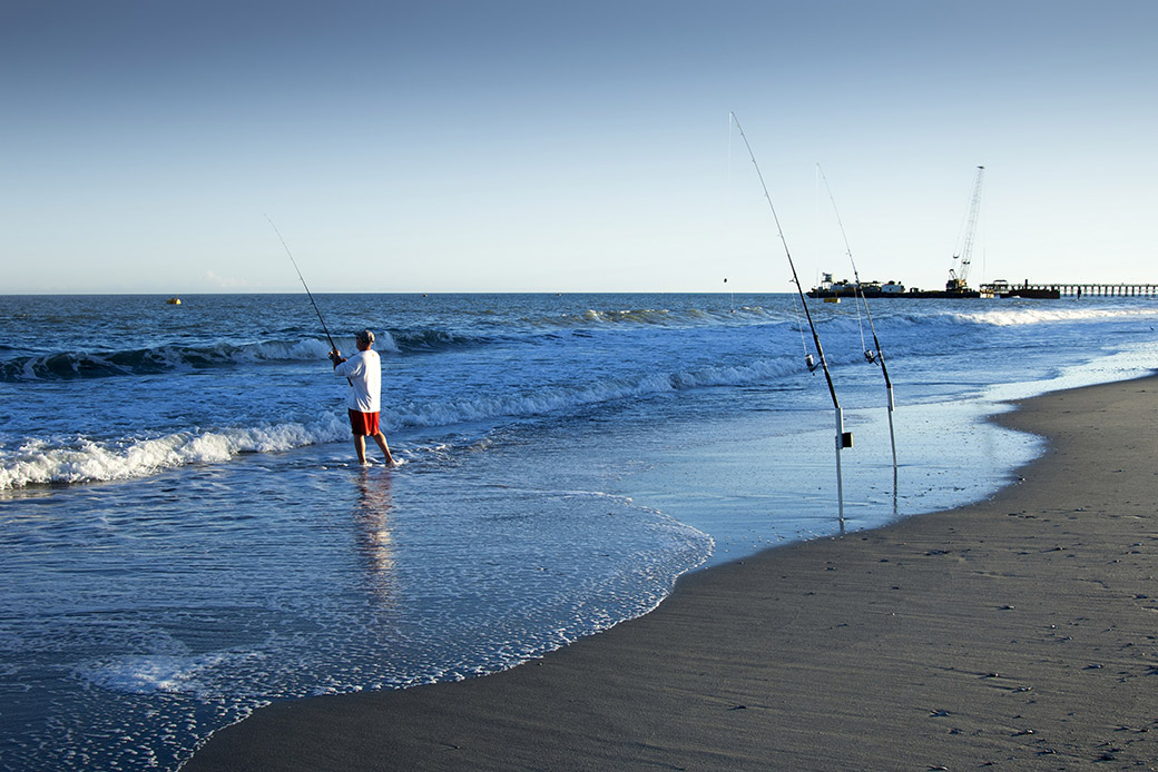People are seen fishing in Myrtle Beach, South Carolina. (Getty/John Coletti)
