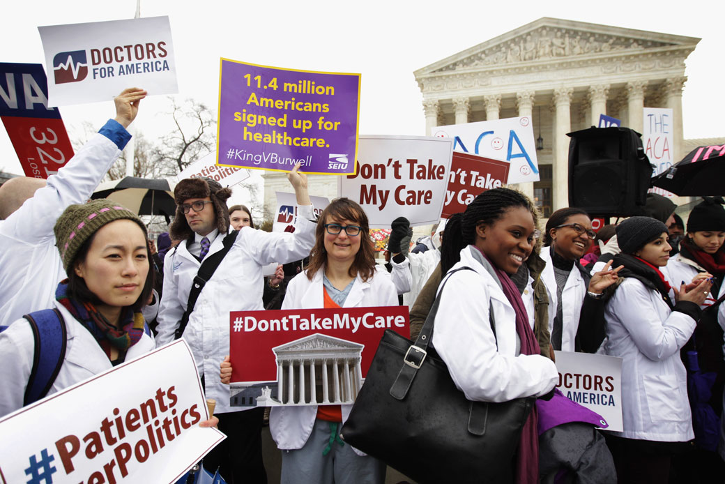 Supporters of the Affordable Care Act gather in front of the U.S Supreme Court during a rally in Washington, D.C., March 2015. (Alex Wong/Getty)