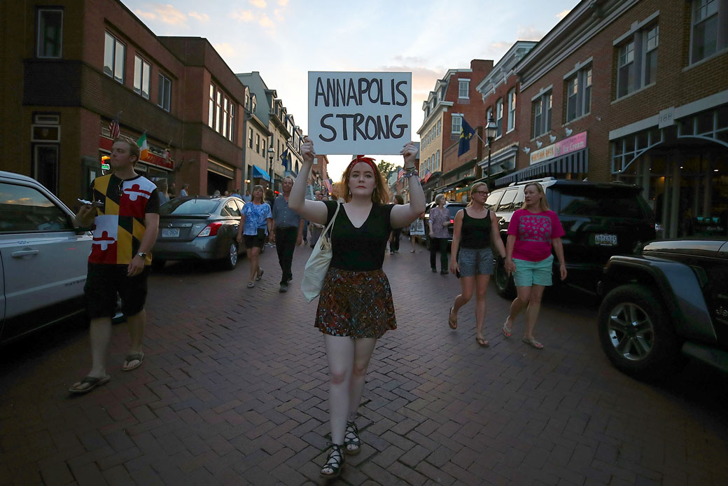 A vigil is held on June 29, 2018, in honor of the five people who were shot and killed at the <em>Capital Gazette</em> newsroom in Annapolis, Maryland. (Getty/Mark Wilson)