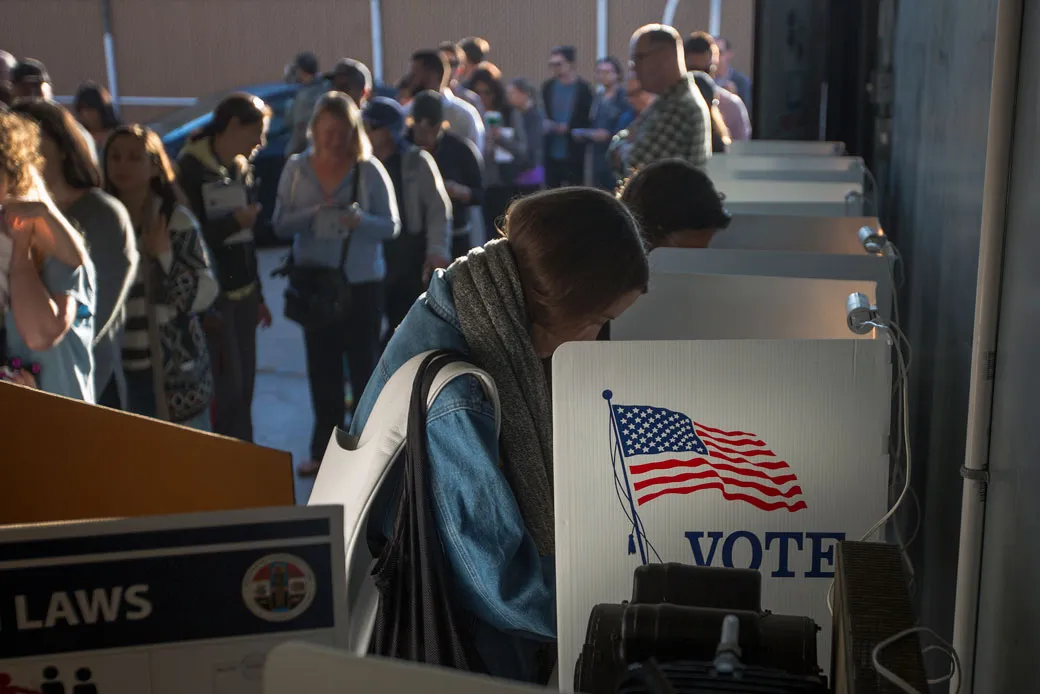 People vote at a Los Angeles lifeguard station in Venice Beach on November 8, 2016. (Getty/David McNew)