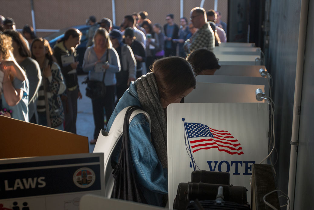 People vote at a Los Angeles lifeguard station in Venice Beach on November 8, 2016. (Getty/David McNew)