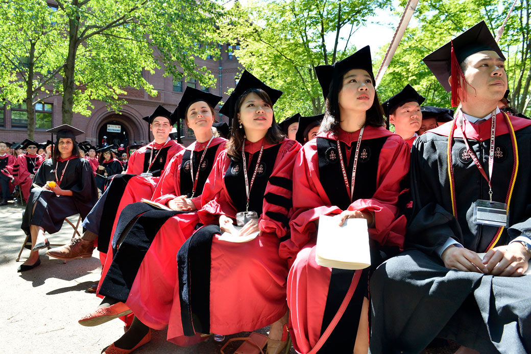 Students attend Harvard University's 2018 367th Commencement at the university in Cambridge, Massachusetts, on May 24, 2018. (Getty/Paul Marotta)
