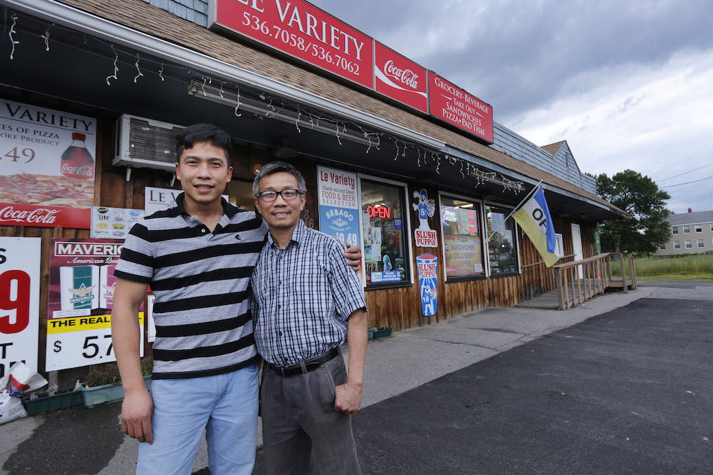 Quang Nguyen, a Vietnamese immigrant and business owner, stands in front of Le Variety, (Getty/Derek Davis/Portland Press Herald)