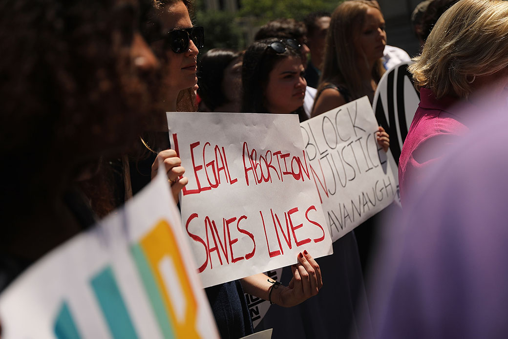 Local politicians, activists, and others participate in a protest to denounce President Donald Trump's selection of Brett Kavanaugh as his nomination to the U.S. Supreme Court, July 10, 2018, in New York City. (Getty/Spencer Platt)