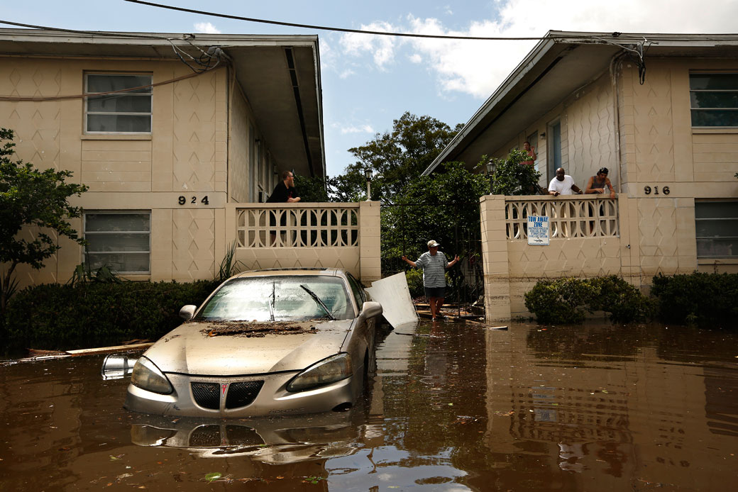 A car sits in floodwater on September 12, 2017, after Hurricane Irma hit the San Marco neighborhood in Jacksonville, Florida.