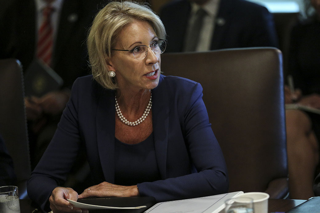 Education Secretary Betsy DeVos speaks during a Cabinet meeting in the Cabinet Room of the White House on August 16, 2018, in Washington. (Getty/Oliver Contreras)