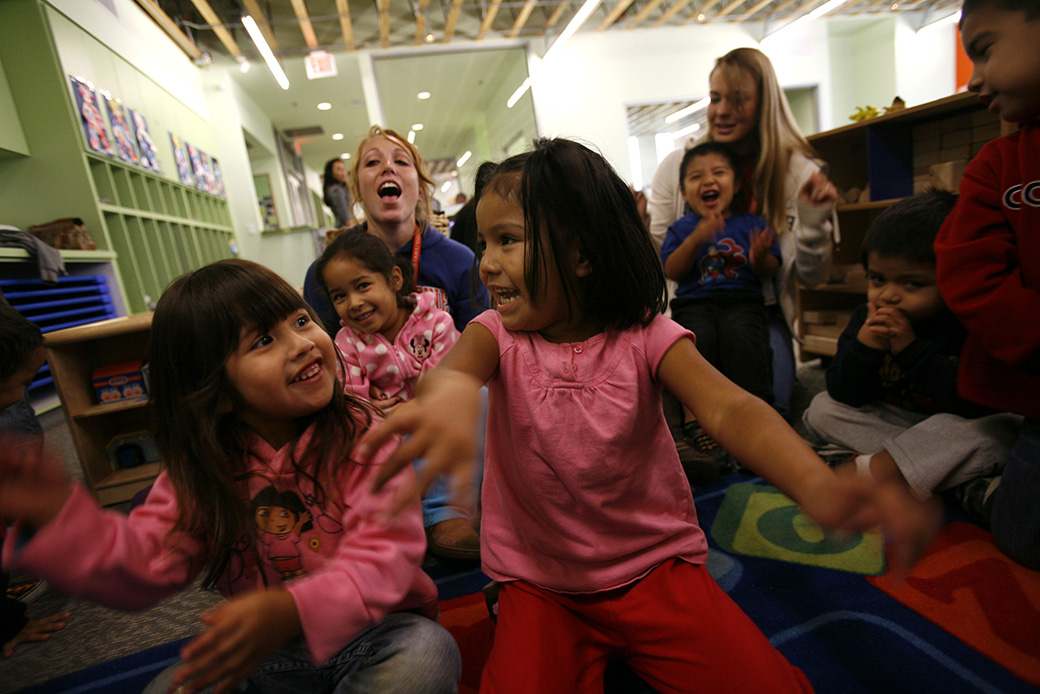 Children sing songs and dance during play hour at an early learning program in Los Angeles in 2008. (Getty/Barbara Davidson)