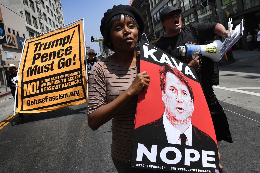 Demonstrators march through Los Angeles streets during the Unite for Justice rally in protest of Judge Brett Kavanaugh's confirmation to the U.S. Supreme Court, August 26, 2018. (Getty/AFP/Mark Ralston)