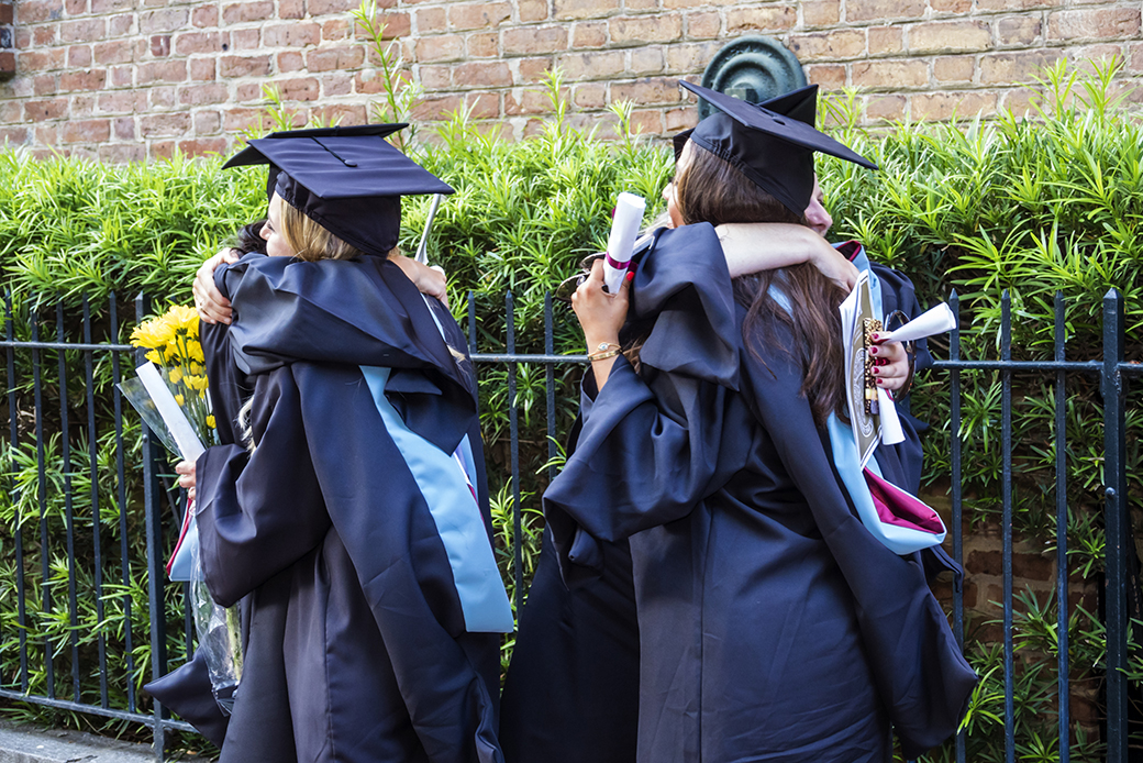 Students pose for pictures at a South Carolina graduation ceremony. (Getty/Jeffrey Greenberg)