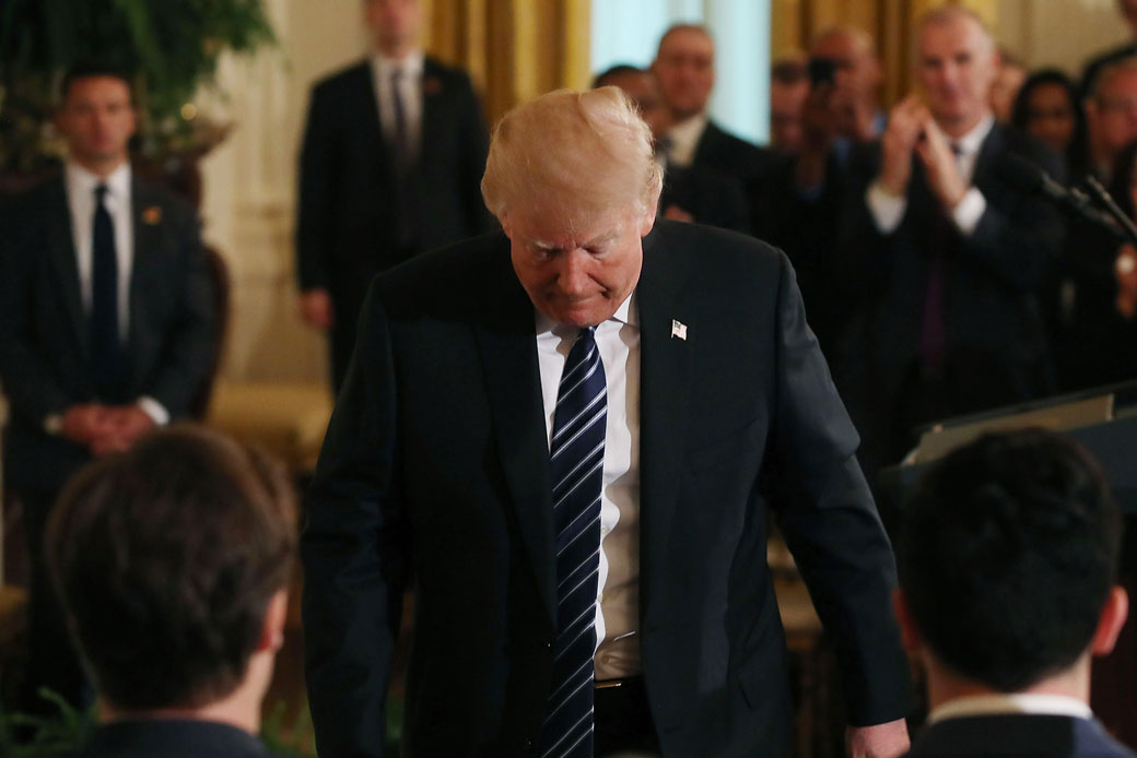 President Donald Trump walks away after speaking at a prison reform summit in the East Room of the U.S. White House, Washington, D.C., May 2018. (Getty/Mark Wilson)