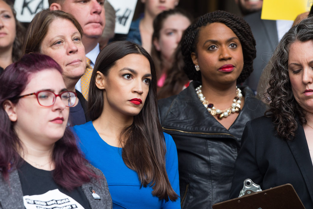 Newly elected Reps. Alexandria Ocasio-Cortez (D-NY) and Ayanna Pressley (D-MA) stand together in Boston, October 2018. (Getty/Scott Eisen)