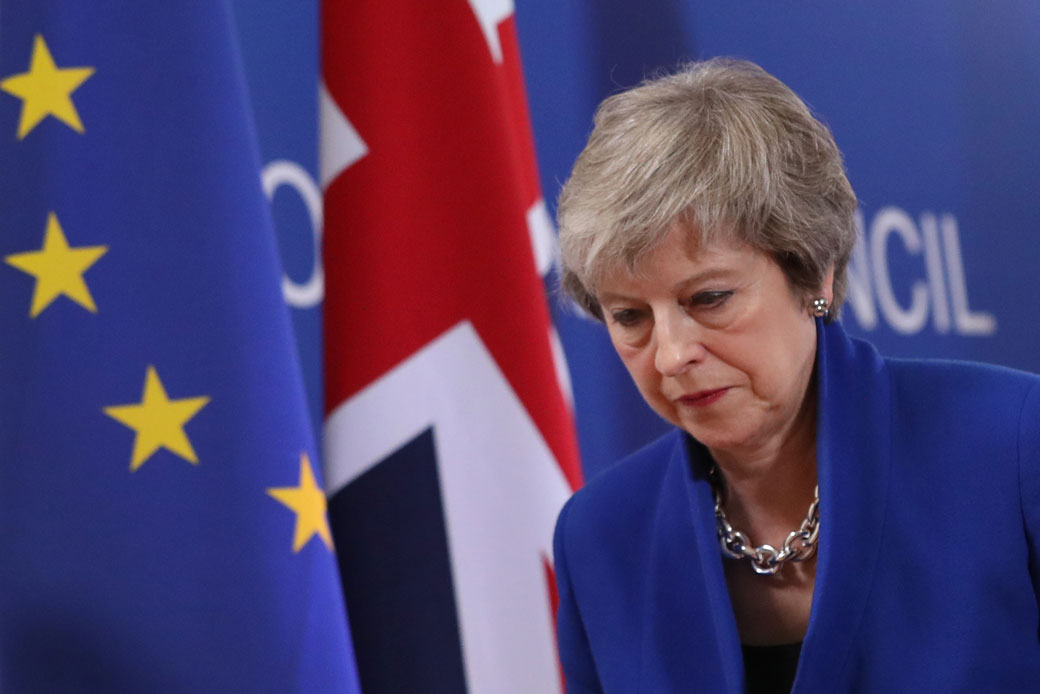 British Prime Minister Theresa May departs her press conference following the European Council's special session over Brexit on November 25, 2018, in Brussels, Belgium. (Getty/Sean Gallup)