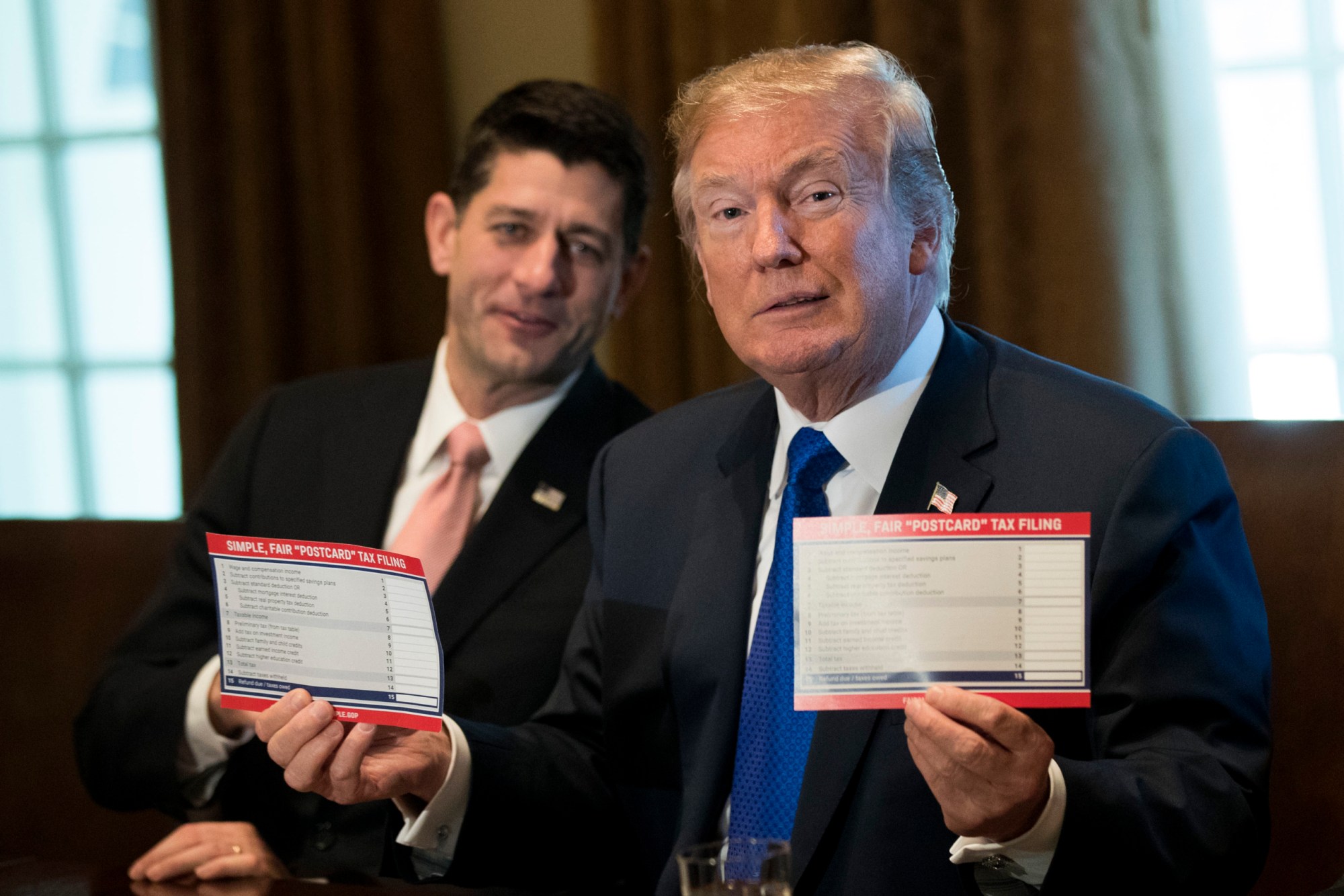 WASHINGTON, DC - NOVEMBER 02: Speaker of the House Paul Ryan looks on as President Donald Trump speaks about tax reform legislation in the Cabinet Room at the White House, November 2, 2017 in Washington, DC. On Thursday, Republican lawmakers unveiled their plans for a massive rewrite of the U.S. tax code. (Drew Angerer/Getty Images)