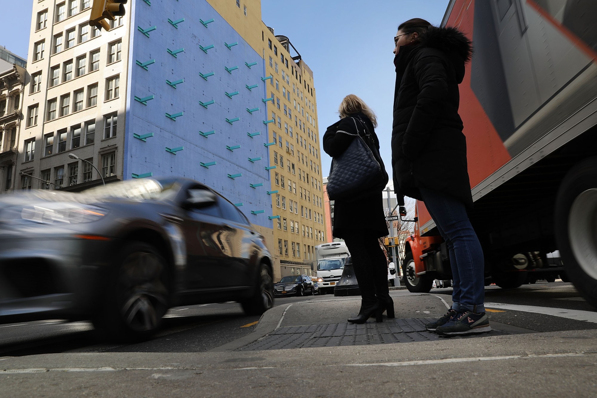 NEW YORK, NY - MARCH 06: Pedestrians walk along a Manhattan street on March 6, 2018 in New York City. A new report by the Governors Highway Safety Association estimates the number of pedestrian deaths last year was 6,000 nationwide, a 33-year high. The report highlights a number of factors for the continued increase including distracted drivers using mobile devices and a larger number of cars on the road due to an improved economy. Despite an accident yesterday that took the lives of two small children in Brooklyn, New York City has been seeing a steady decline of pedestrian deaths since Mayor Bill de Blasio's Vision Zero initiative. (Photo by Spencer Platt/Getty Images)