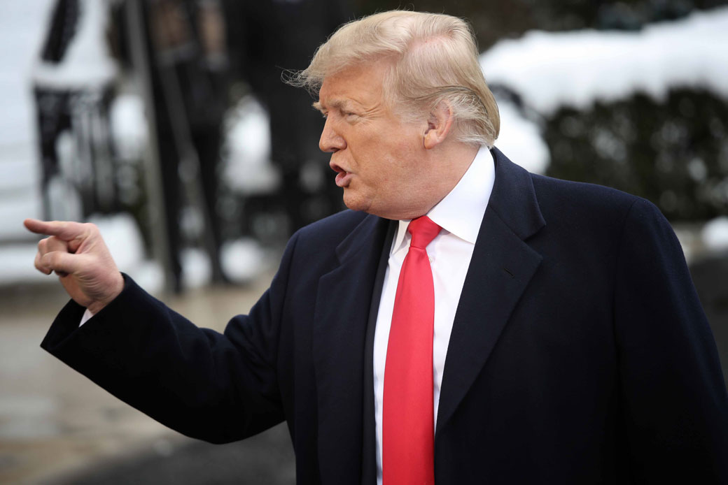 President Donald Trump answers questions from the press as he departs the White House, January 2019. (Getty/Win McNamee)