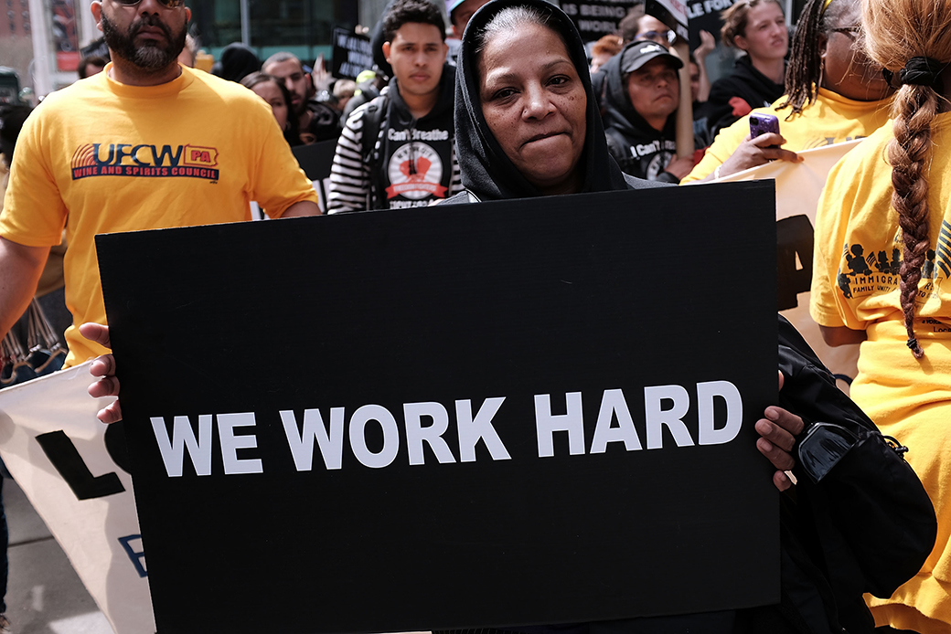 Low-wage workers, many of them in the fast food industry, join with supporters to demand a minimum wage of $15 per hour, April 15, 2015, in New York City. (Getty/Spencer Platt)