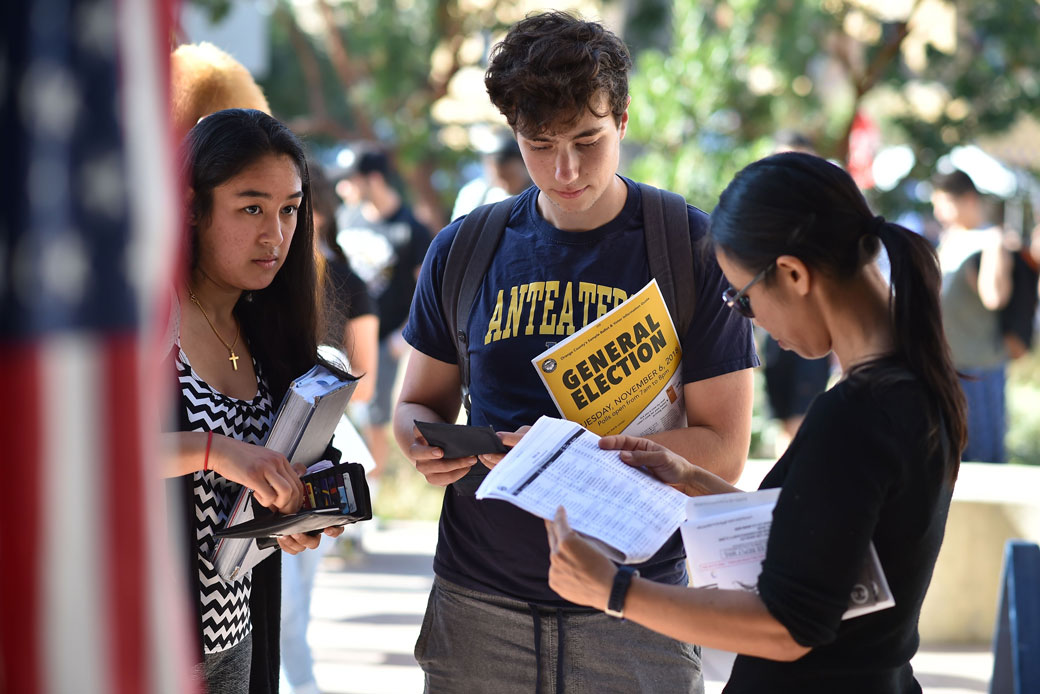 Students wait in line to cast their ballot at a polling station in Irvine, California, November 2018.